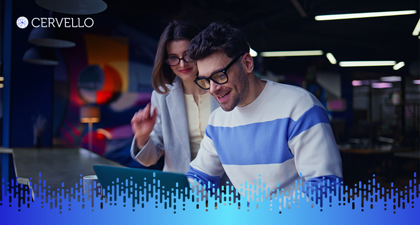 Duas pessoas trabalhando em um escritório moderno com foco em serviços de negócios globais, destacando colaboração e inovação na área de global business services.